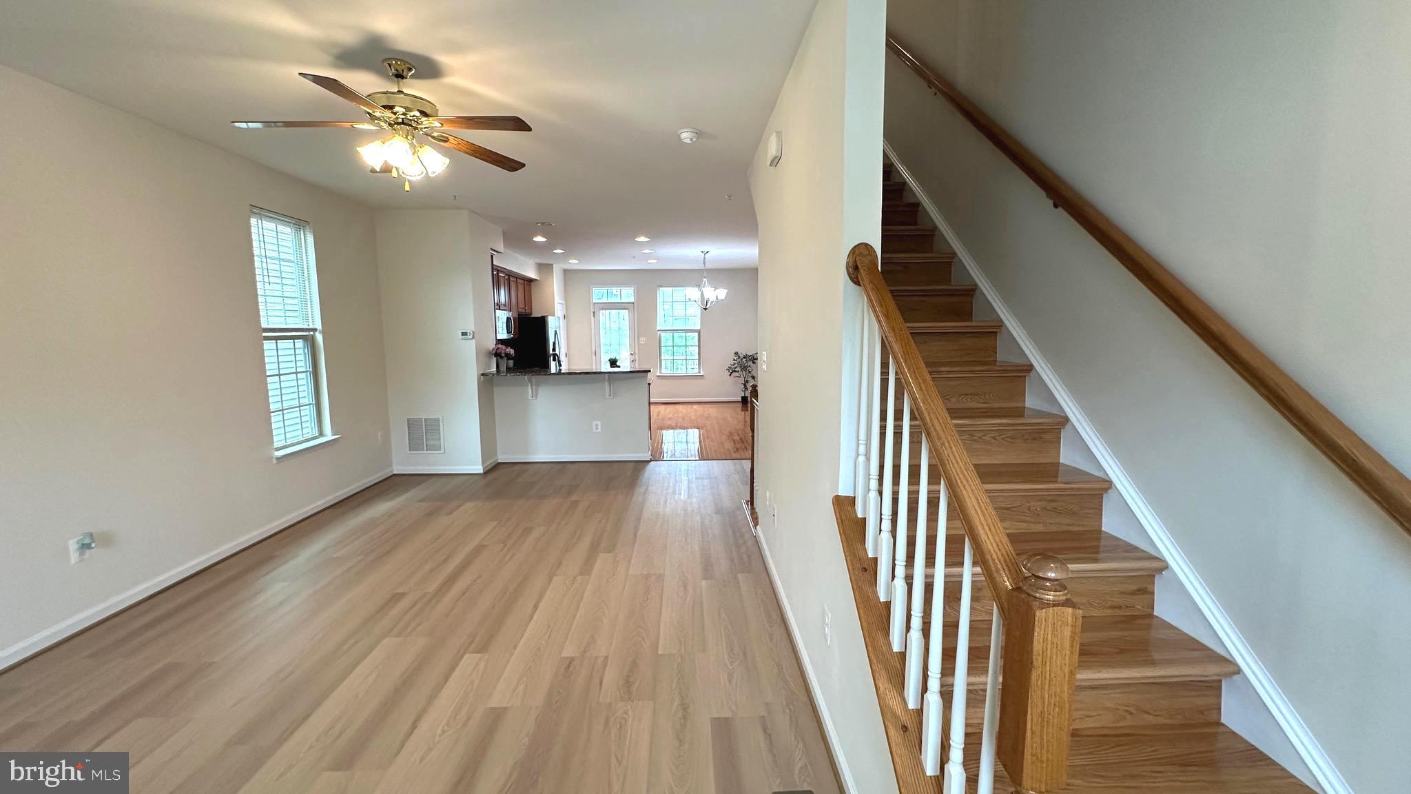 7343 Old Calvary Road Hanover, MD 21076 - Photo 17 of 35 wooden floor in an empty room with a window