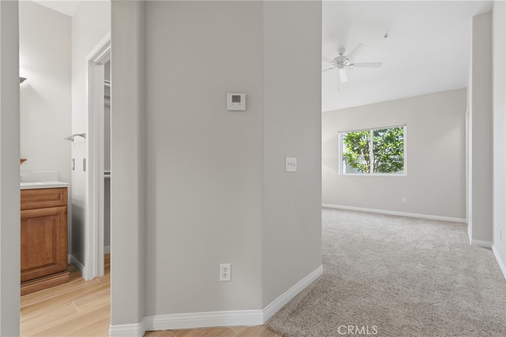 33576 Winston Way, Unit A Temecula, CA 92592 - Photo 18 of 44 an empty room with windows