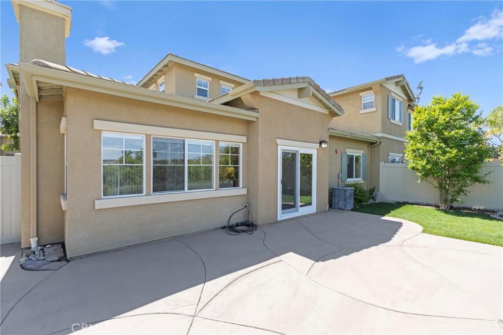 33576 Winston Way, Unit A Temecula, CA 92592 - Photo 31 of 44 a front view of a house with a yard