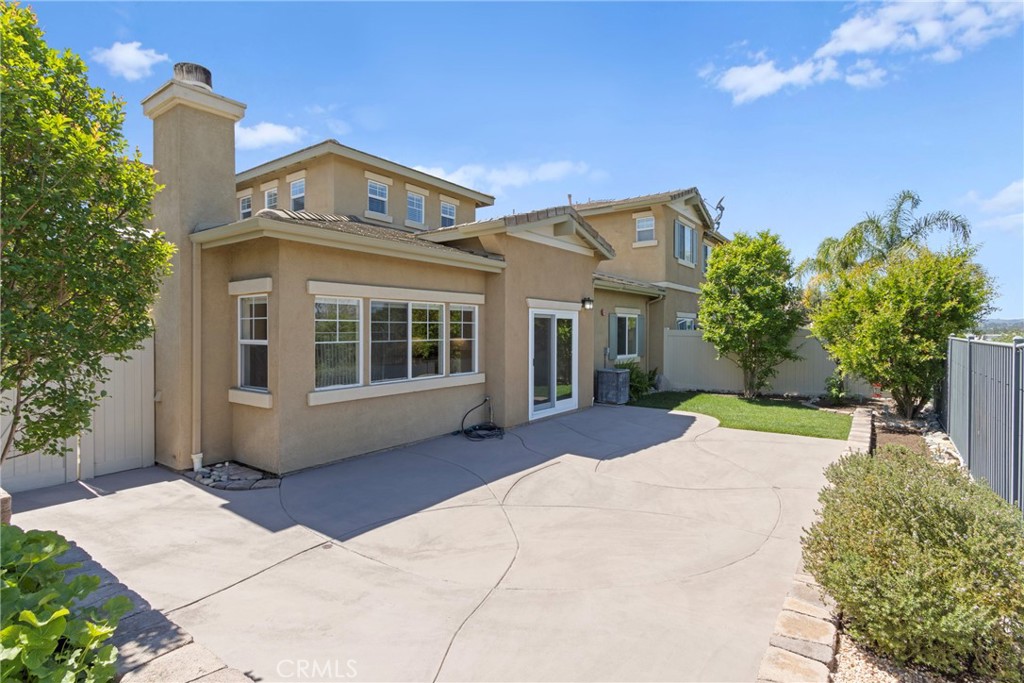 33576 Winston Way, Unit A Temecula, CA 92592 - Photo 32 of 44 a front view of a house with garden