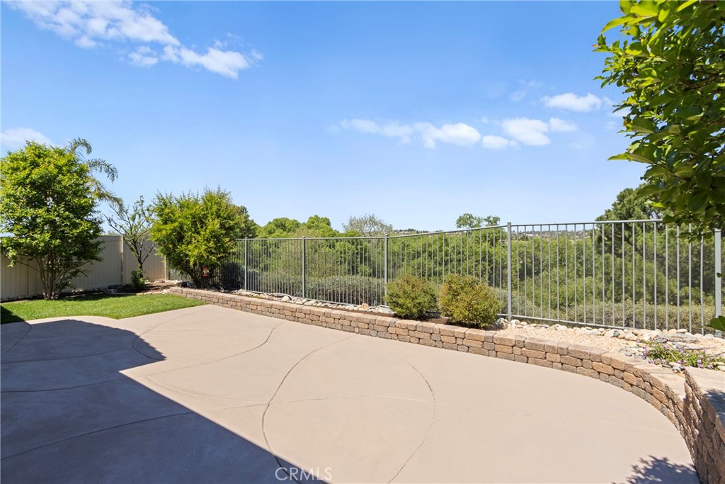 33576 Winston Way, Unit A Temecula, CA 92592 - Photo 35 of 44 a view of a street with a yard
