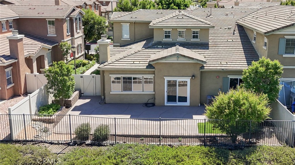 33576 Winston Way, Unit A Temecula, CA 92592 - Photo 36 of 44 a front view of a house with a garden