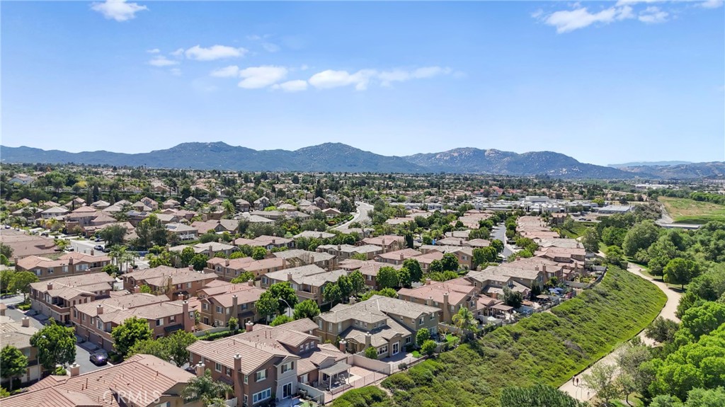 33576 Winston Way, Unit A Temecula, CA 92592 - Photo 37 of 44 an aerial view of residential houses with outdoor space and trees
