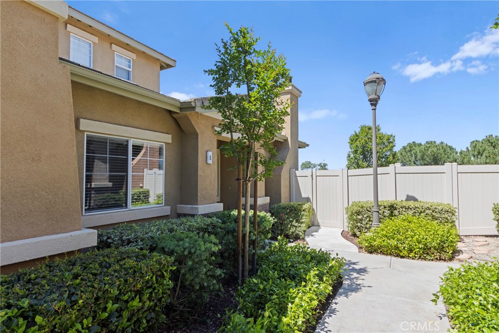 33576 Winston Way, Unit A Temecula, CA 92592 - Photo 40 of 44 a view of a garden with a fountain