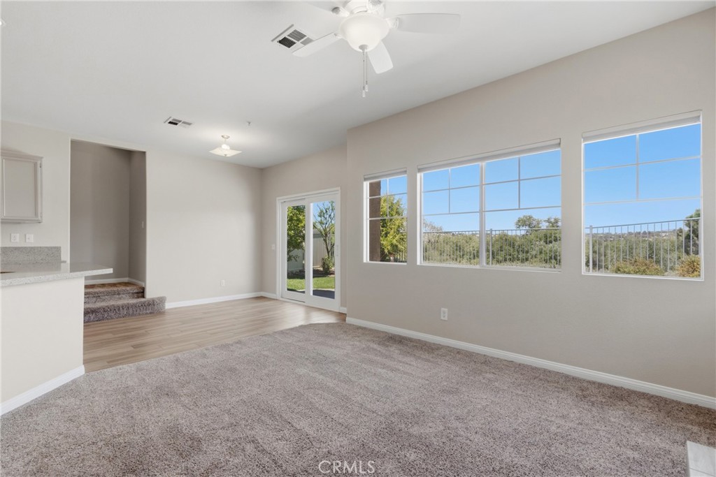 33576 Winston Way, Unit A Temecula, CA 92592 - Photo 5 of 44 a view of an empty room with a window
