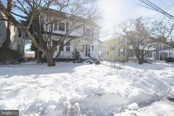 a view of snow on the side of road