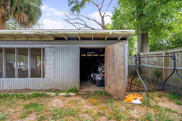 a view of a house with a back yard