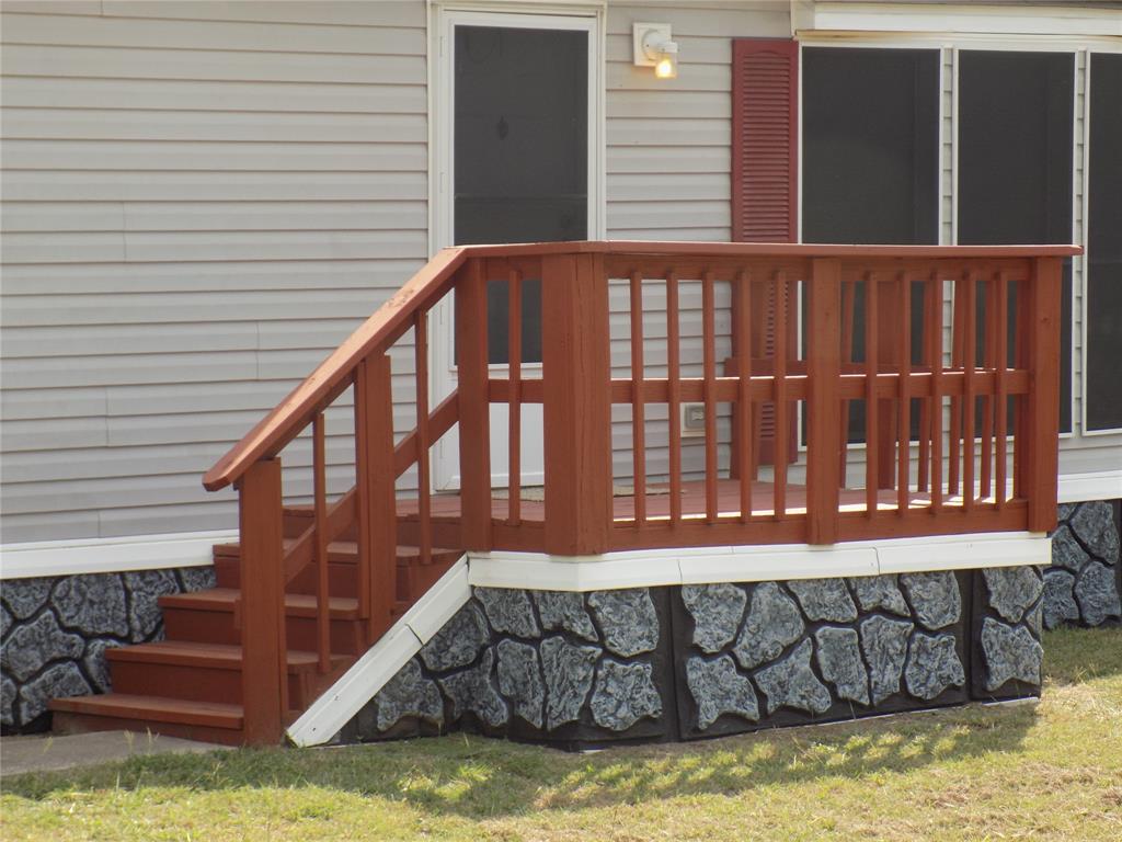 3450 Sarra Lane Springtown, TX 76082 - Photo 3 of 23 Deck at front door.