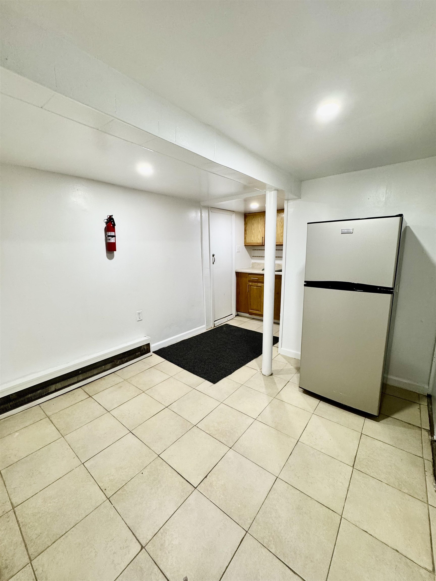 204 Zabriskie Street, Unit 1 & G Jersey City, NJ 07307 - Photo 16 of 21 a bathroom with a sink and a refrigerator