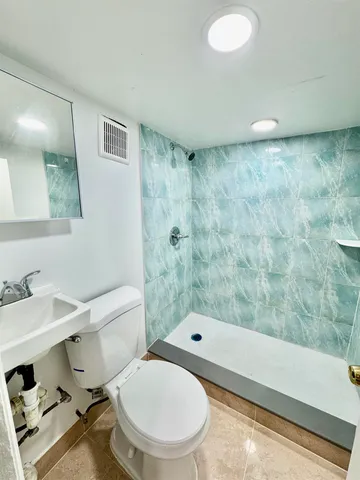 a view of a house with a barbeque