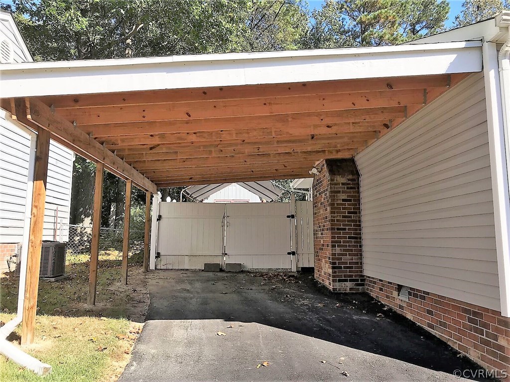16031 Tri Gate Road Chester, VA 23831 - Photo 2 of 17 a view of a entrance gate of the house