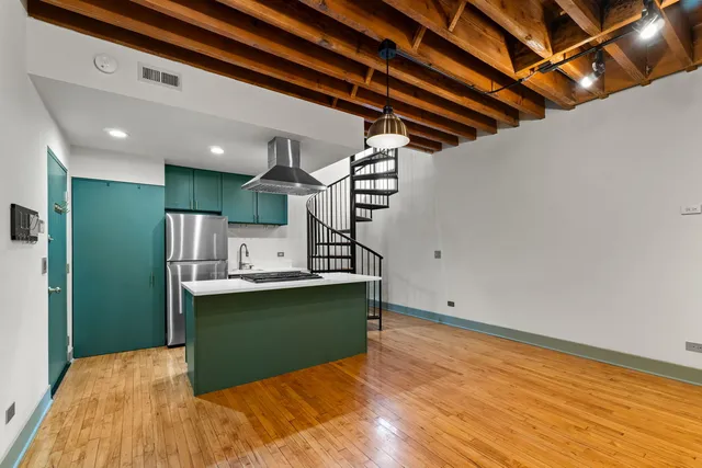 a view of kitchen and utility room