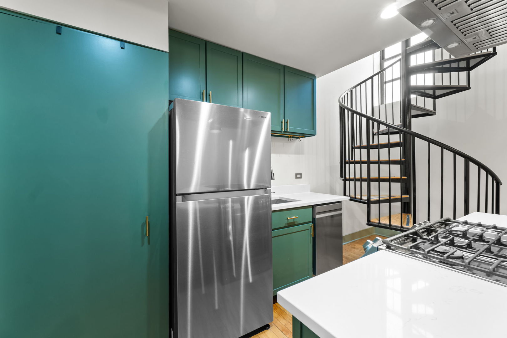 7349 Madison Street, Unit E Forest Park, IL 60130 - Photo 7 of 17 a kitchen with a refrigerator and a sink