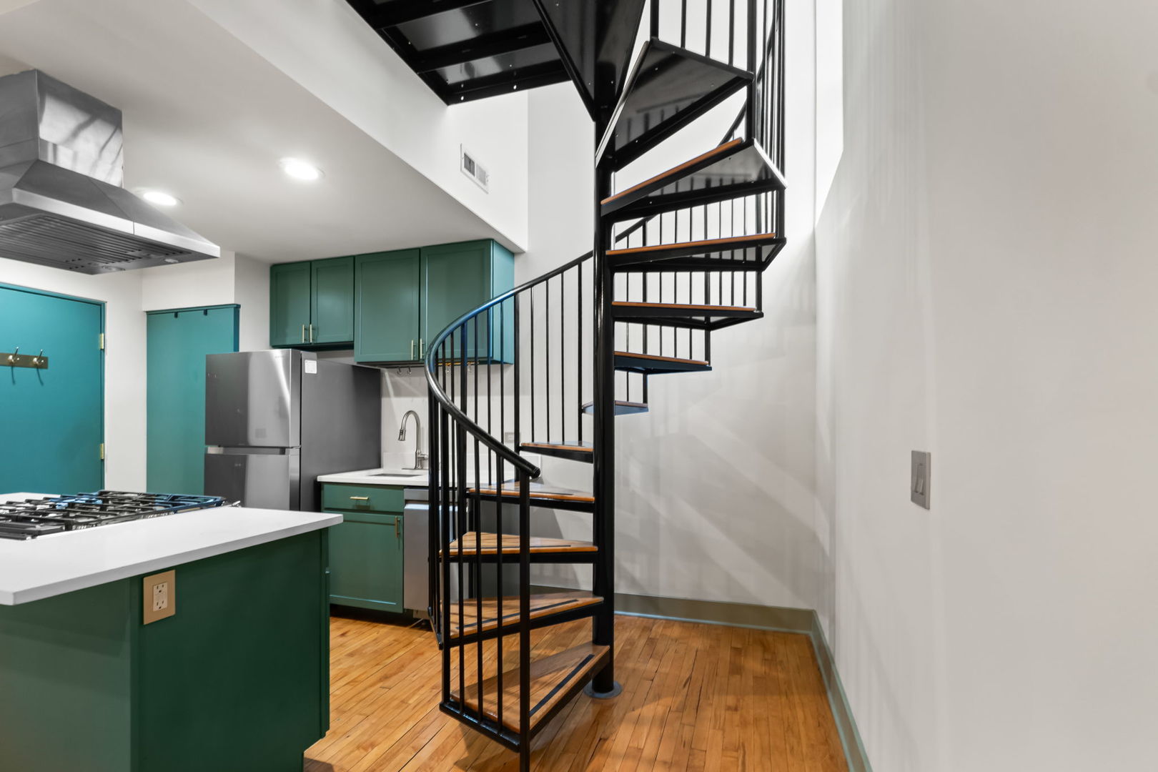 7349 Madison Street, Unit E Forest Park, IL 60130 - Photo 9 of 17 a view of entryway and hall with wooden floor