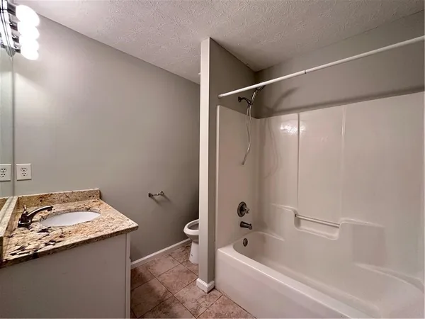 a bathroom with a sink and a bathtub
