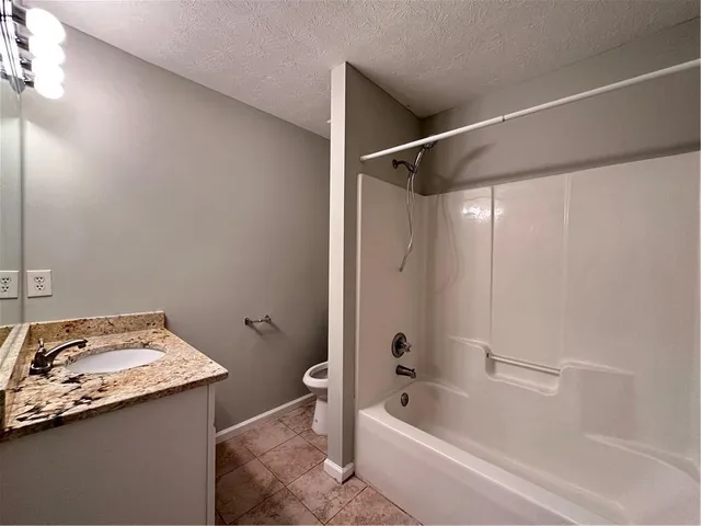 a bathroom with a sink and a bathtub