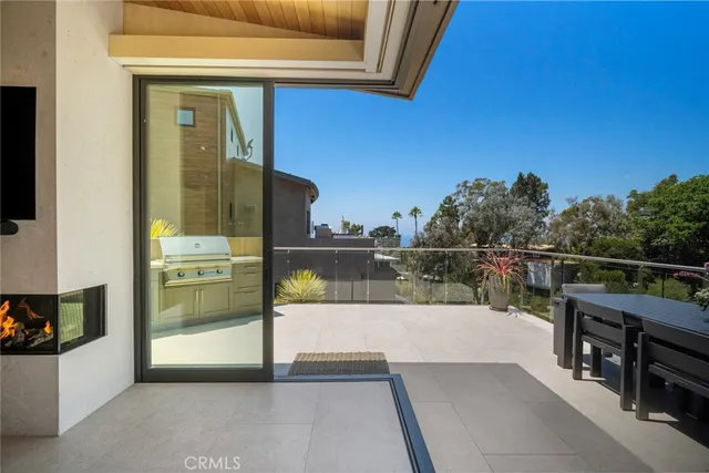 a living room with fireplace furniture and a flat screen tv