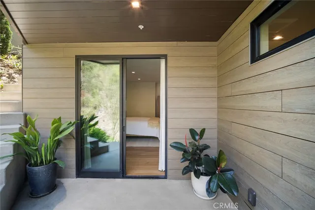 a view of backyard with seating space