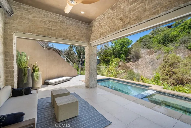 a front view of a house with yard and garage