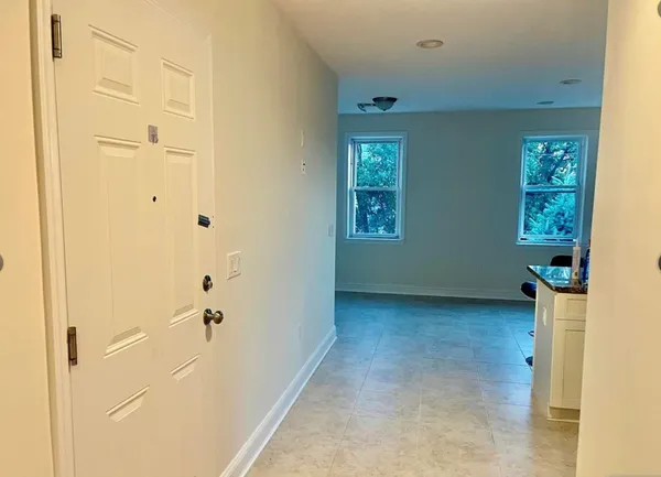 a view of a room with a window