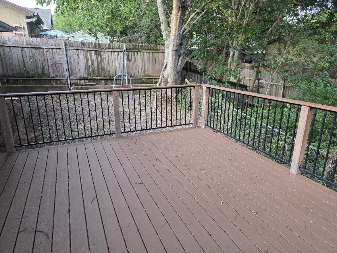 4803 Peach Grove Road Austin, TX 78744 - Photo 17 of 22 a balcony with wooden floor