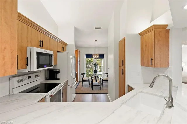 $679,000 | 841 Tanbark Drive, Unit 202, Naples, FL 34108