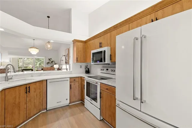 $679,000 | 841 Tanbark Drive, Unit 202, Naples, FL 34108