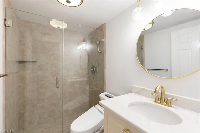 $679,000 | 841 Tanbark Drive, Unit 202, Naples, FL 34108