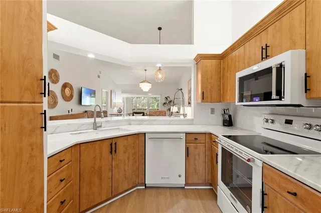 $679,000 | 841 Tanbark Drive, Unit 202, Naples, FL 34108