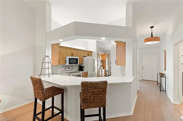 $679,000 | 841 Tanbark Drive, Unit 202, Naples, FL 34108