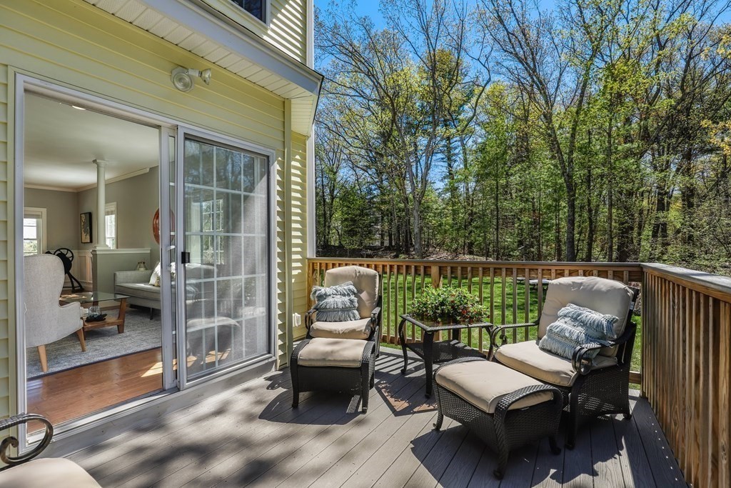 2 Budnick Way Boxford, MA 01921 - Photo 32 of 41 a balcony with furniture and a potted plant