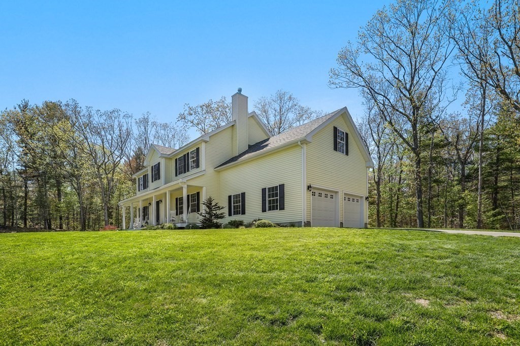 2 Budnick Way Boxford, MA 01921 - Photo 35 of 41 a view of house with a big yard and large trees