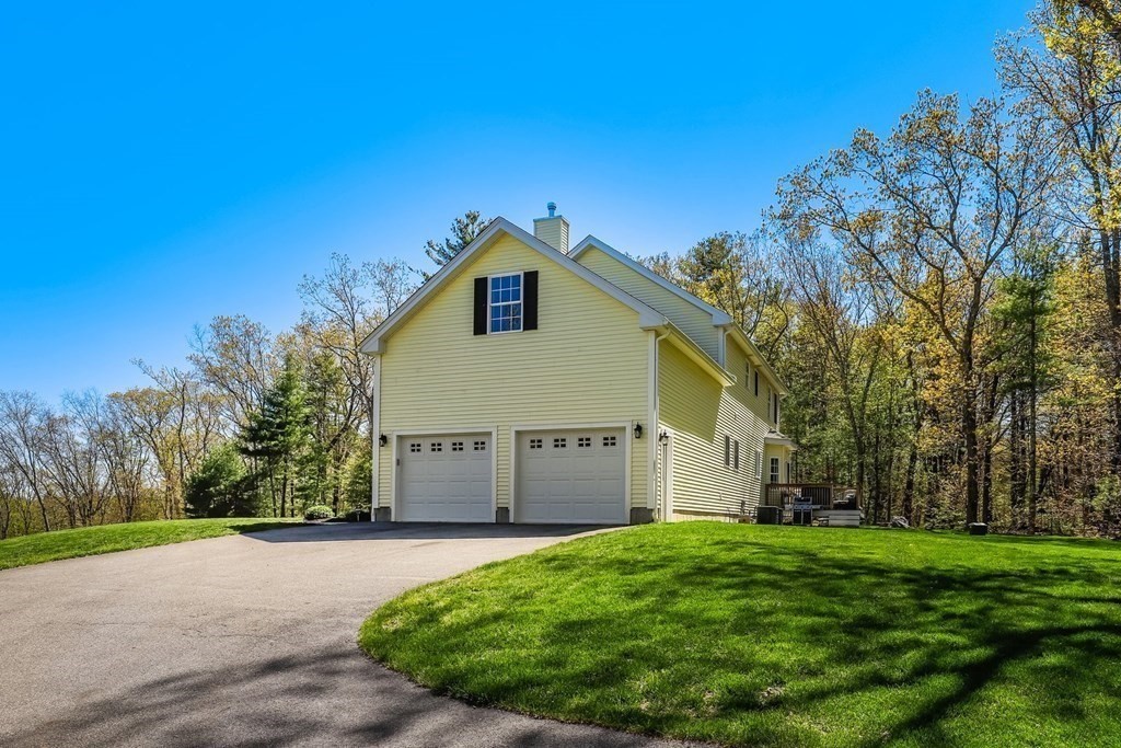 2 Budnick Way Boxford, MA 01921 - Photo 37 of 41 a view of a house with a yard