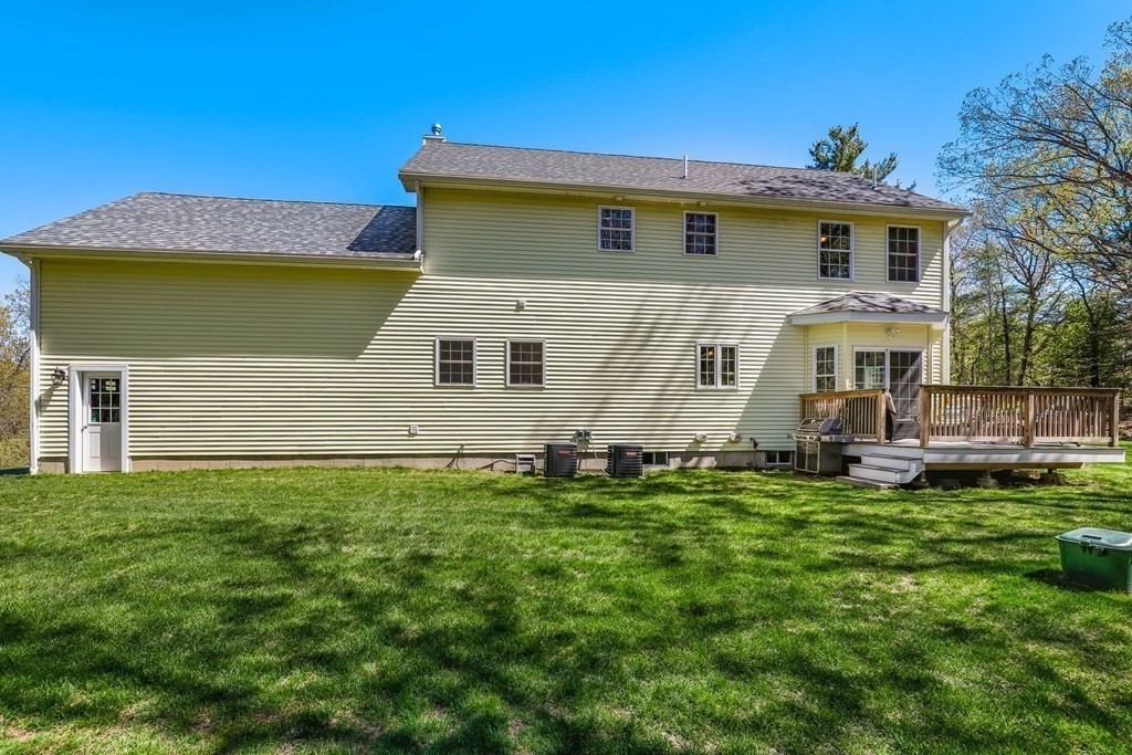 2 Budnick Way Boxford, MA 01921 - Photo 38 of 41 a view of a house with a backyard