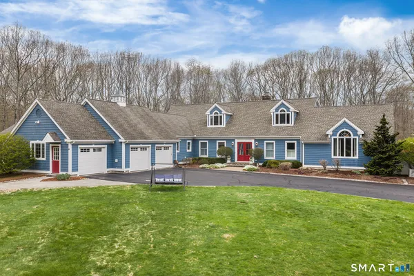front view of a house with a big yard