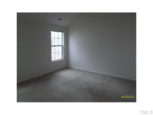 1444 Ricochet Drive Raleigh, NC 27610 - Photo 6 of 8 a open hall with a window