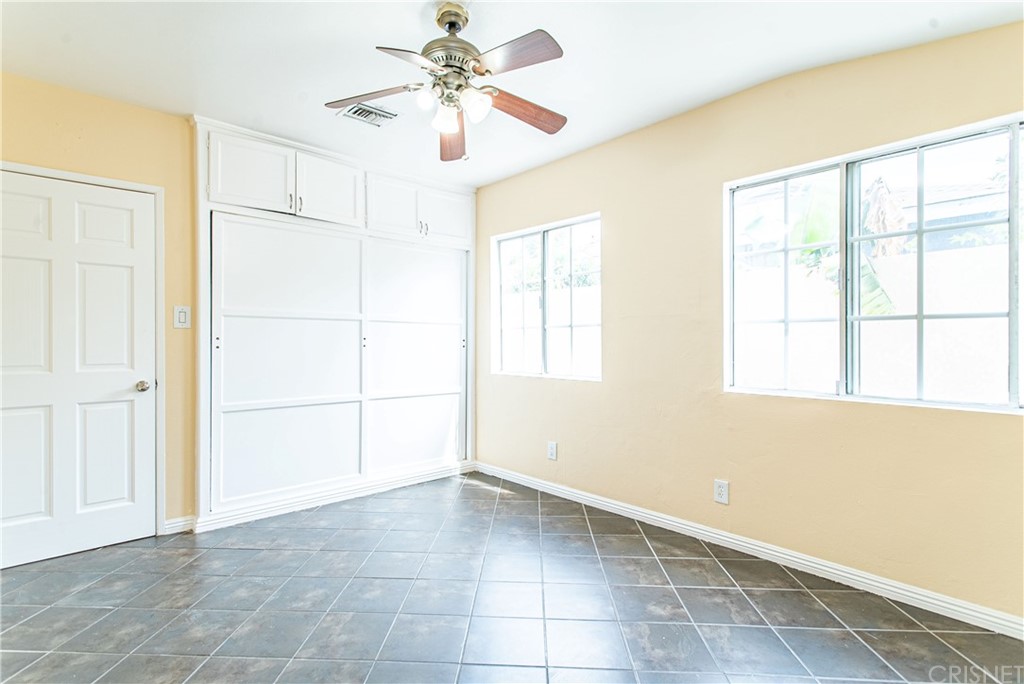 6839 Tampa Avenue Reseda, CA 91335 - Photo 25 of 48 a view of an empty room with a window