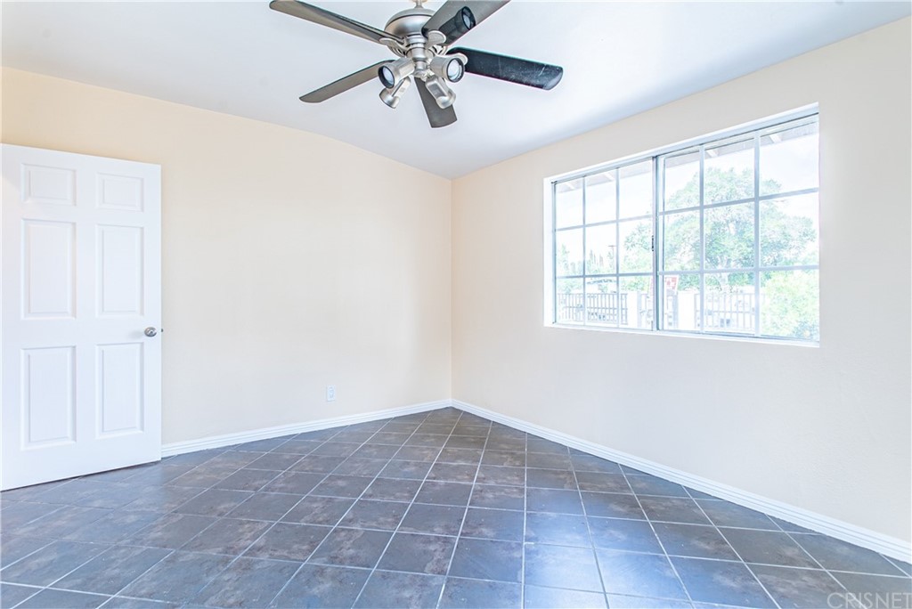6839 Tampa Avenue Reseda, CA 91335 - Photo 27 of 48 a view of an empty room with a window
