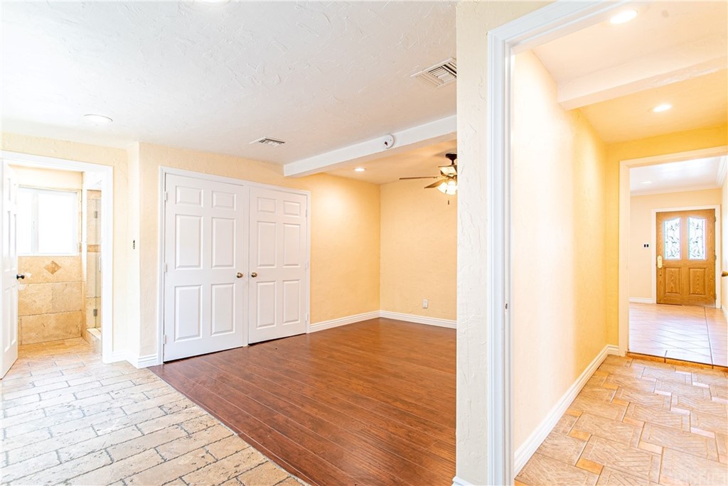 6839 Tampa Avenue Reseda, CA 91335 - Photo 36 of 48 a view of a bathroom with a shower and a sink