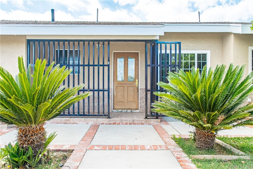6839 Tampa Avenue Reseda, CA 91335 - Photo 4 of 48 a view of a entryway door front of house