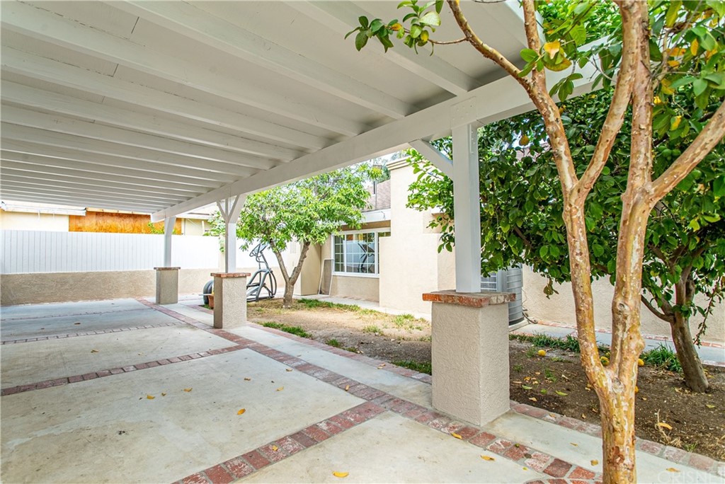 6839 Tampa Avenue Reseda, CA 91335 - Photo 48 of 48 a house with a tree in front