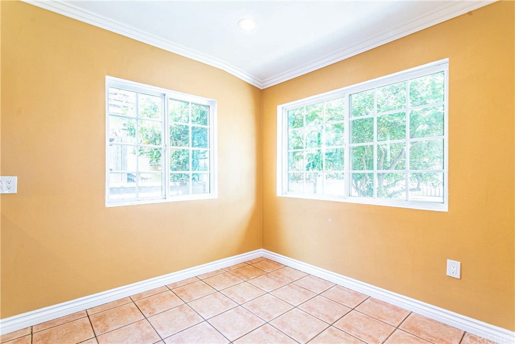 6839 Tampa Avenue Reseda, CA 91335 - Photo 9 of 48 a view of an empty room with a window