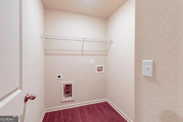 a room with a hardwood and a ceiling fan