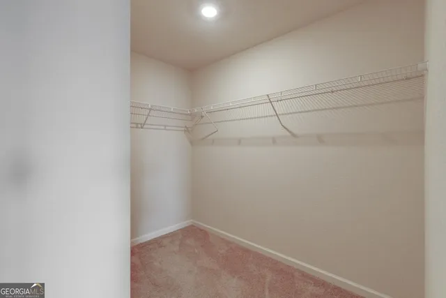 a view of a room with racks on the wall