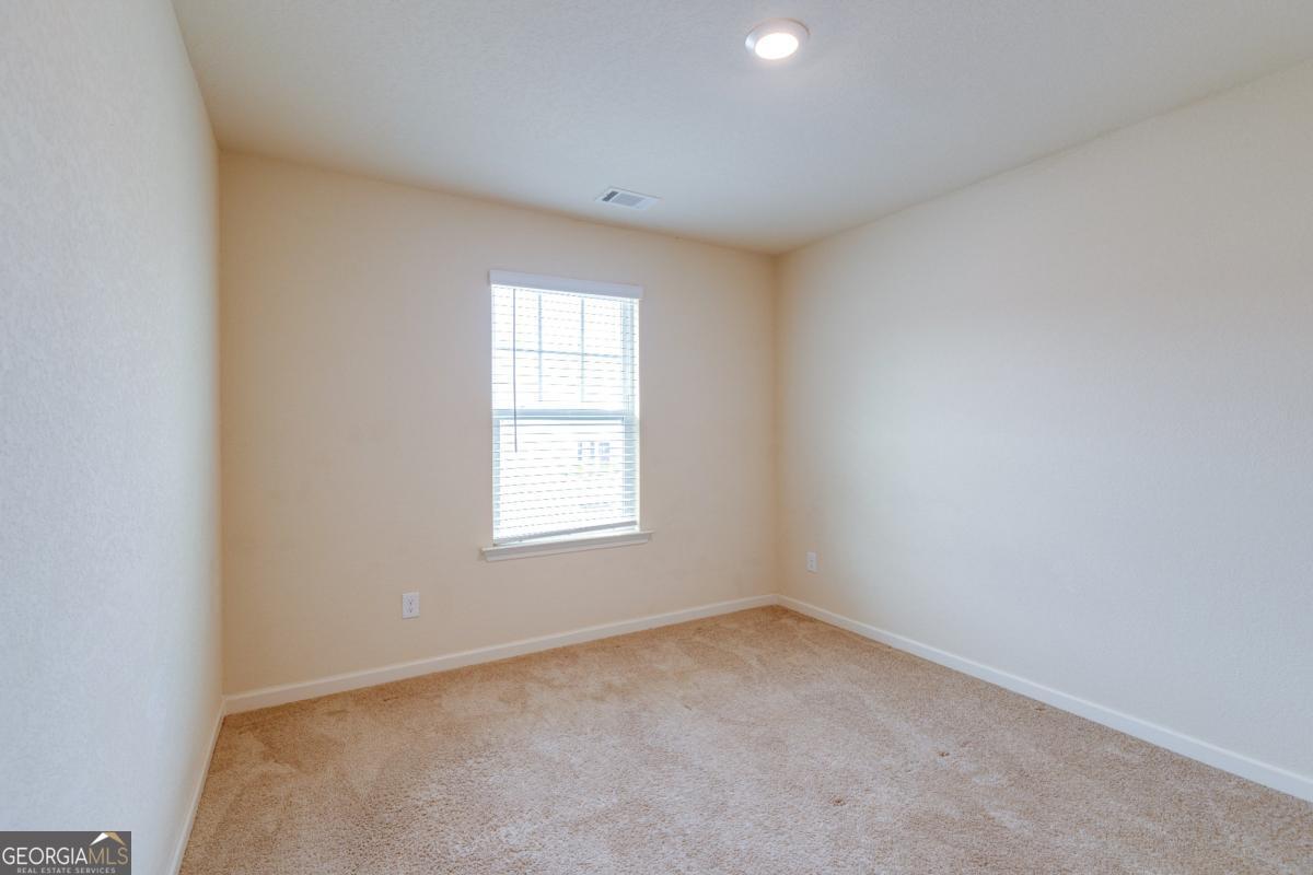 410 Winter Chase Pendergrass, GA 30567 - Photo 21 of 24 an empty room with a window