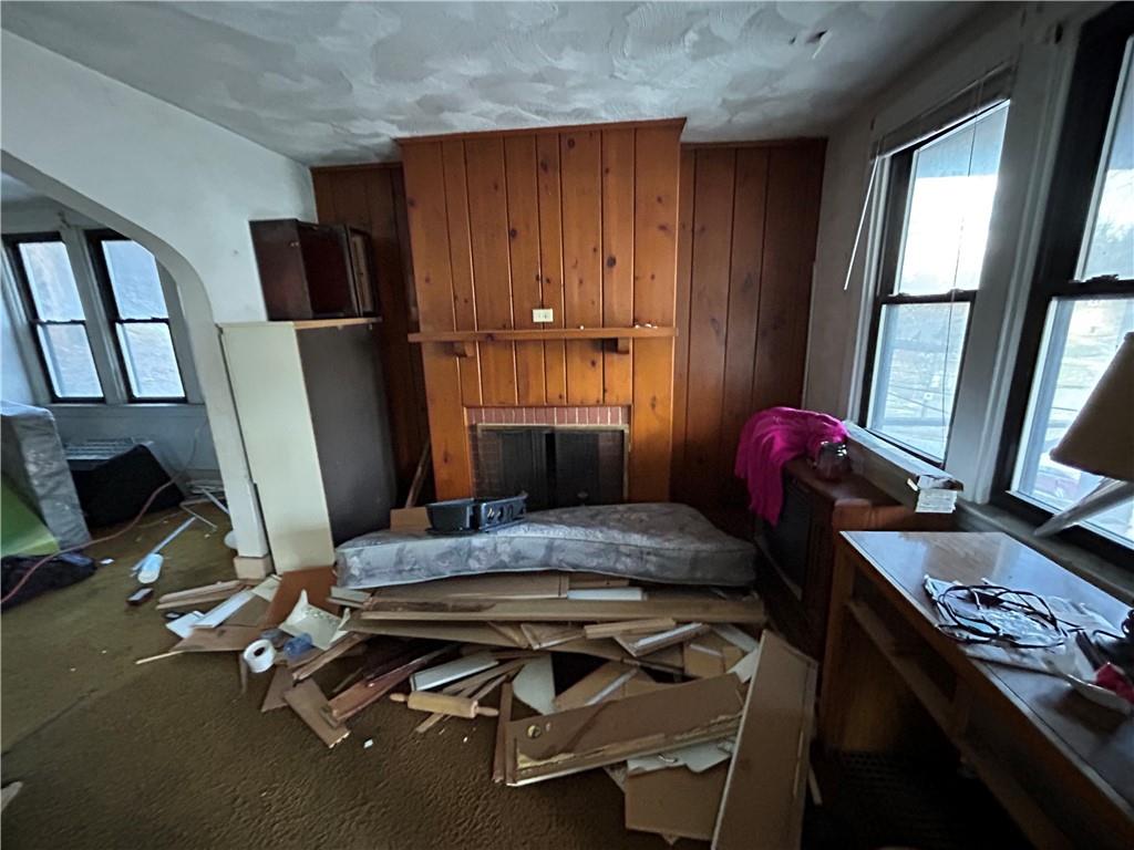 35 Verona Road Pittsburgh, PA 15235 - Photo 4 of 18 a room with furniture and a flat screen tv