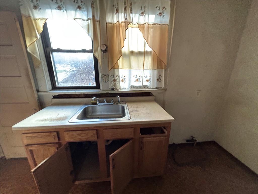 35 Verona Road Pittsburgh, PA 15235 - Photo 8 of 18 a sink sitting next to a window