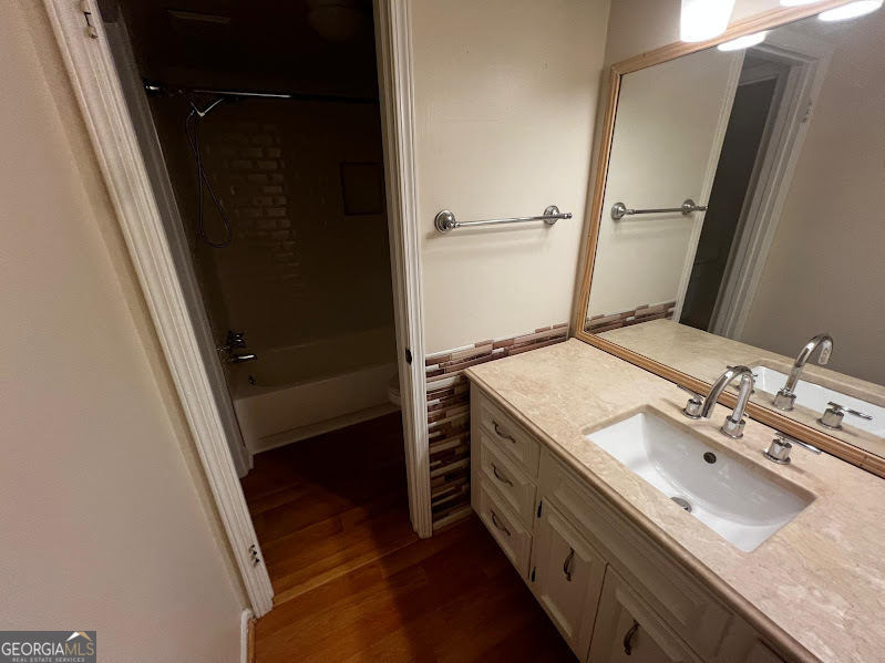 885 Patterns Drive Mableton, GA 30126 - Photo 16 of 22 a bathroom with a double vanity sink and mirror