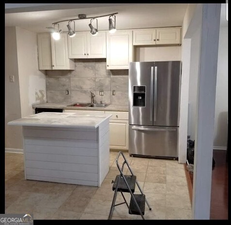885 Patterns Drive Mableton, GA 30126 - Photo 4 of 22 a kitchen with a refrigerator sink and cabinets