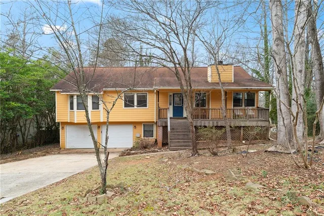 a view of a house with wooden stairs